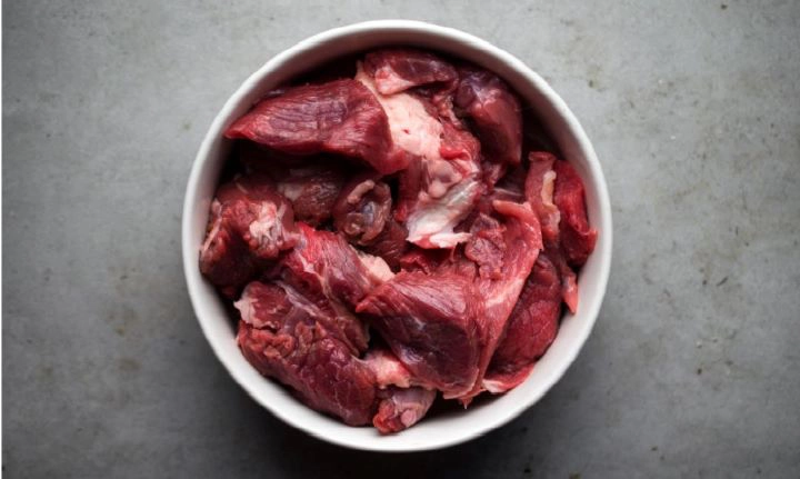 Bowl of raw meat and bones for a raw pet food diet